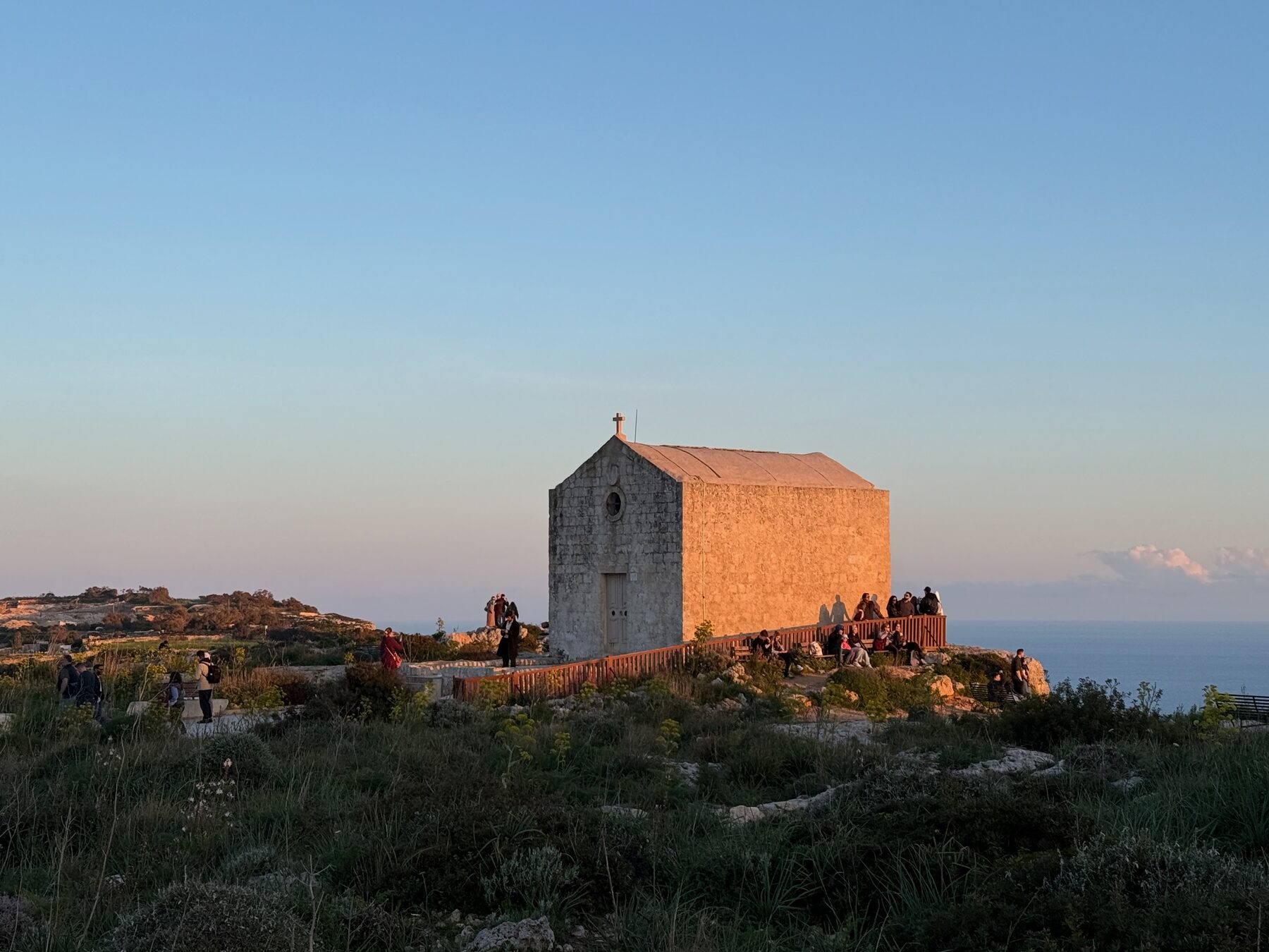 Stone chapel at sunset